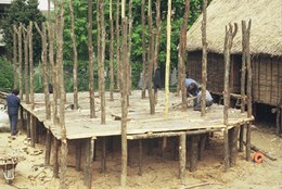 The wooden flooring was laid using split trunks.